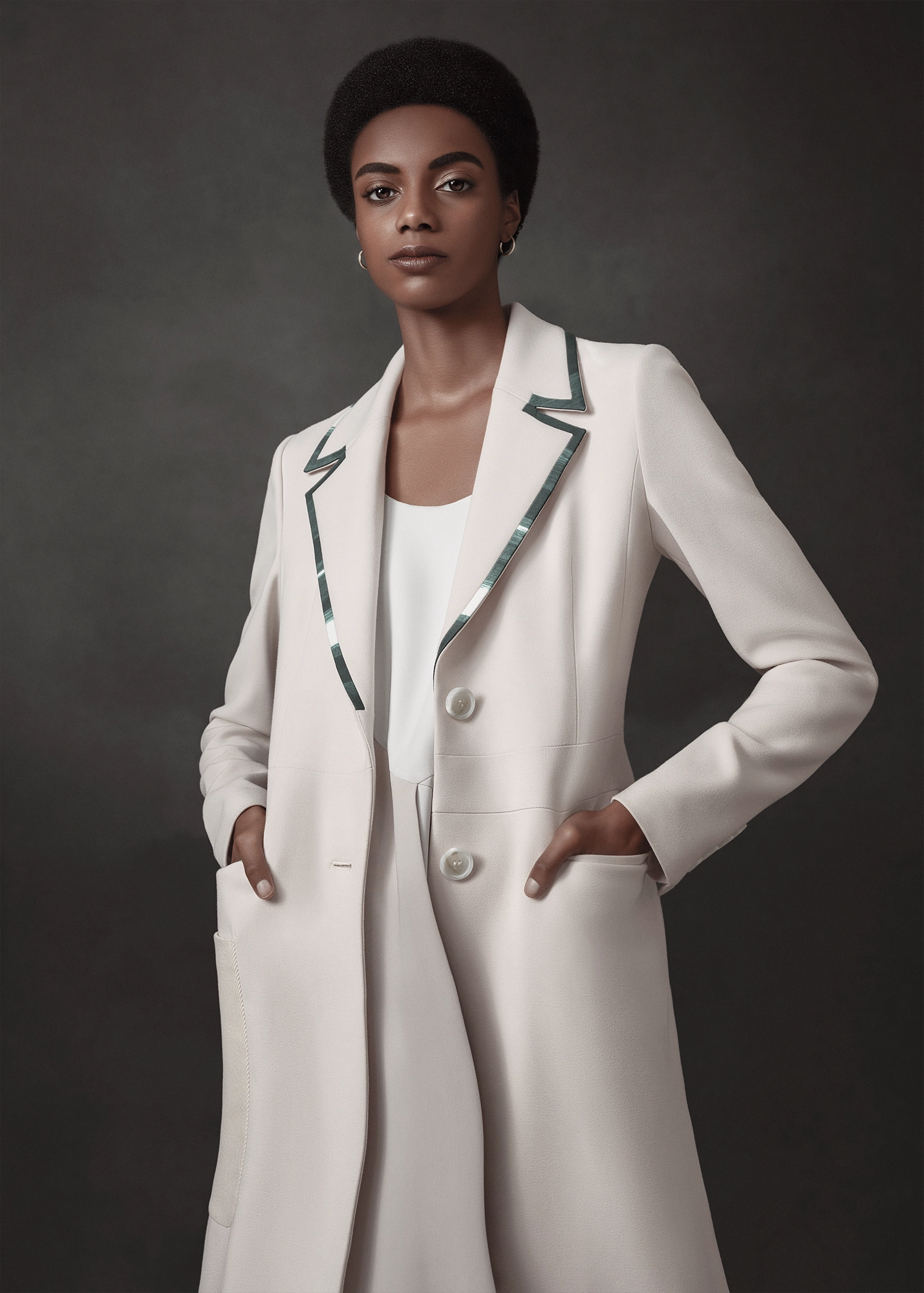Retouched Ivory Resolve fashion portrait with refined skin, controlled ivory garment tones, teal trim details and polished editorial color grading.